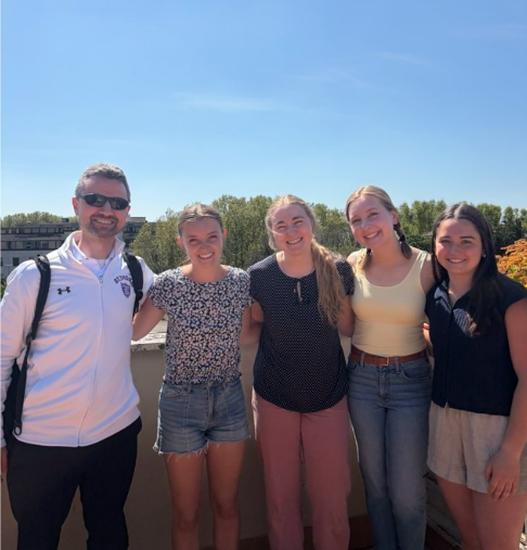 Dr. Jacob Benda with students at the University of St. Thomas Bernardi Campus, Rome.