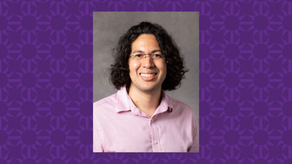Alex Barrios smiles for a photo. There is a purple St. Thomas graphic that serves as a background.