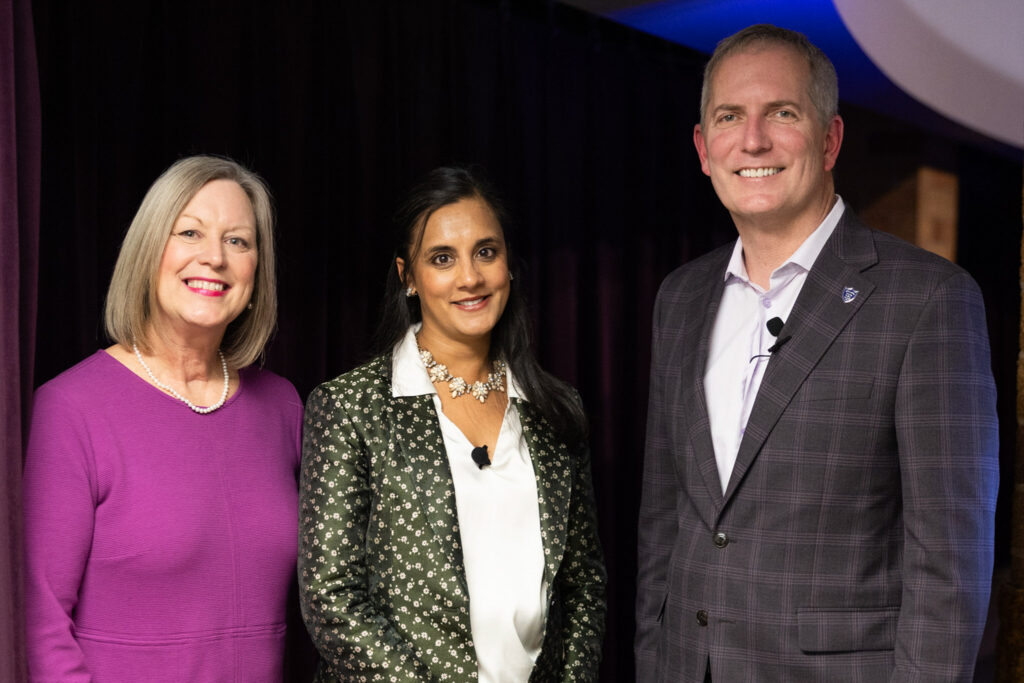Dr. Amy F. Smith, Finding Forward guest speaker Dr. Ulcca Joshi Hansen and President Rob Vischer smile for a photo.