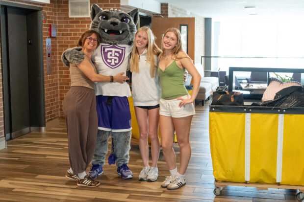 students and families in residence halls as they move to campus