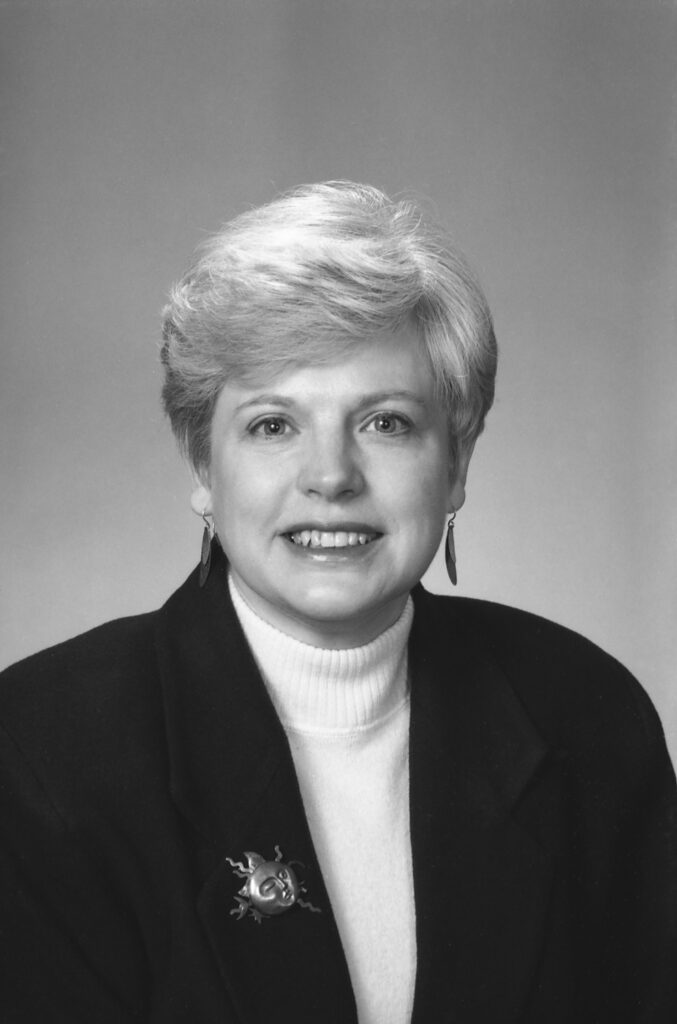 Susan Huber smiles for a portrait.