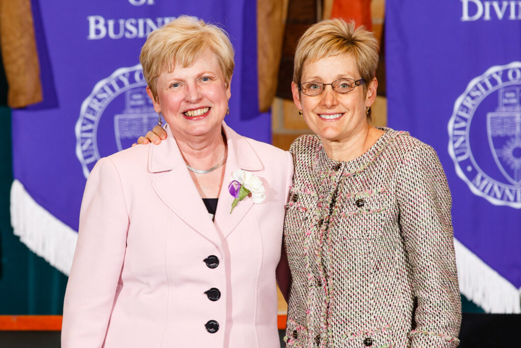 Sue Huber and Julie Sullivan side-by-side smiling for a photo.
