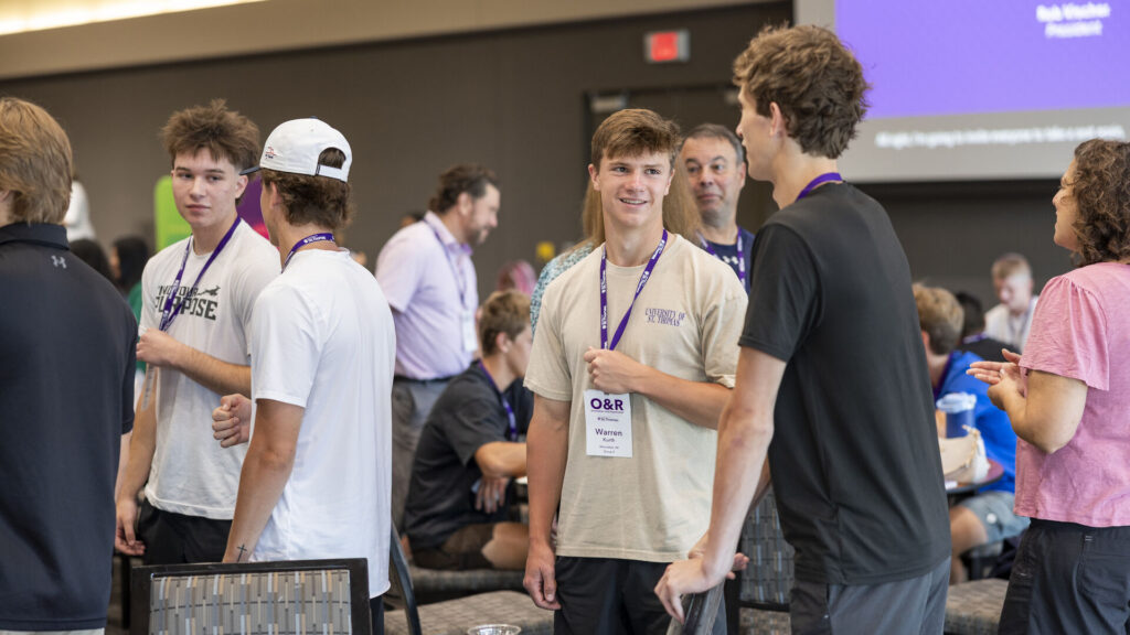 Students in orientation socializing.