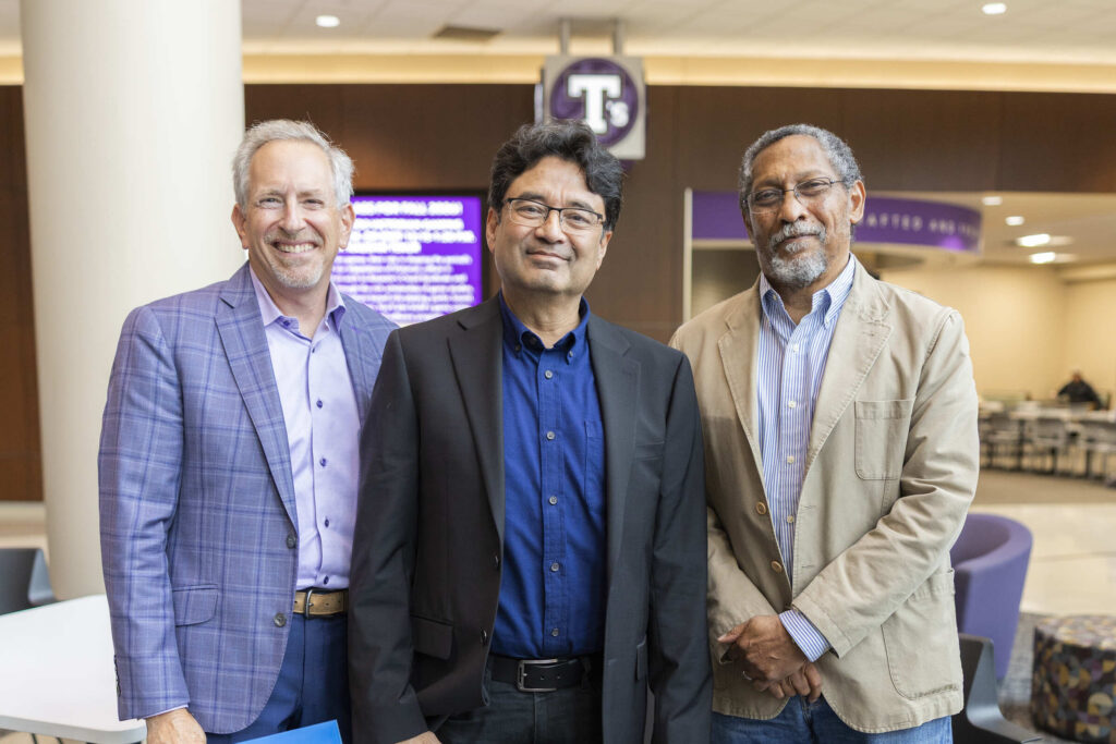 Bill Tolman, Kanishka Chowdhury and Percival Everett pose for a photo.