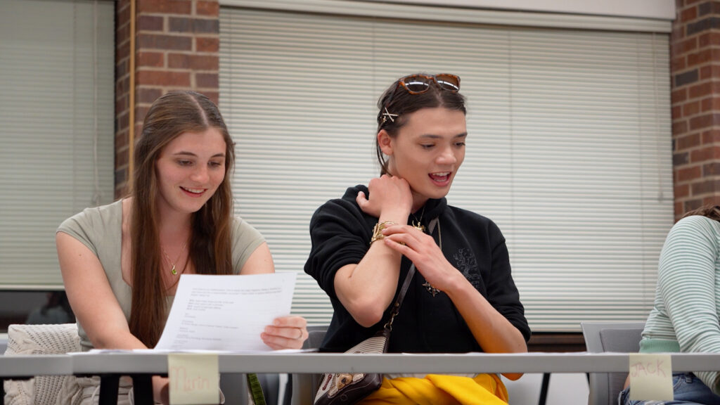 Students Marin Burg and Jack Sawyer participate in a group reading fo the plays.