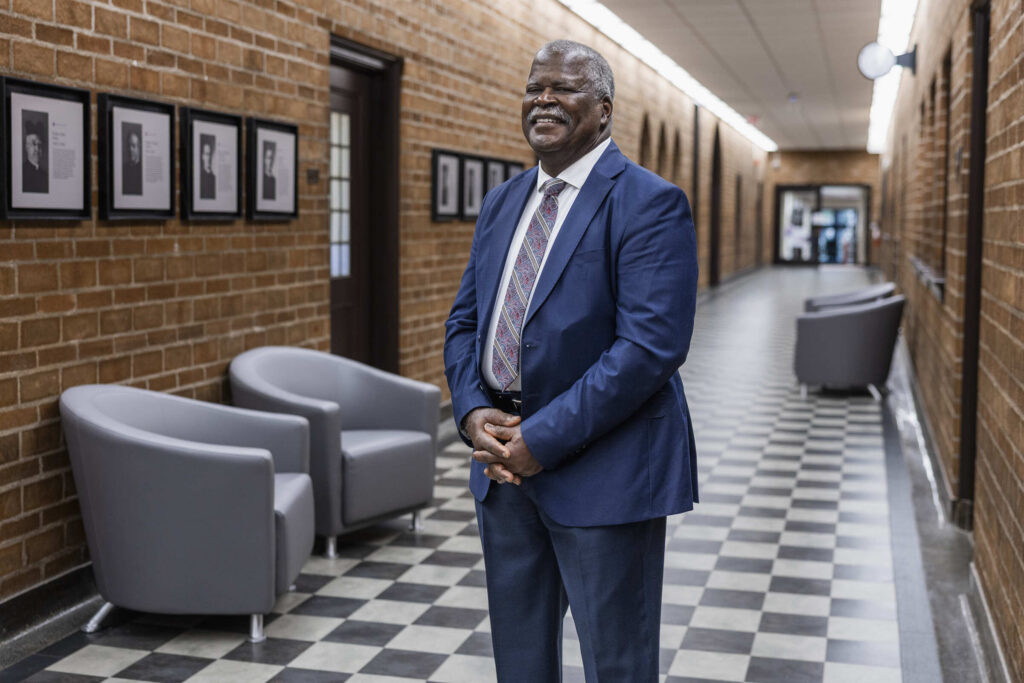 Featured image of Associate Professor Ernest Owens smiling for a portrait.