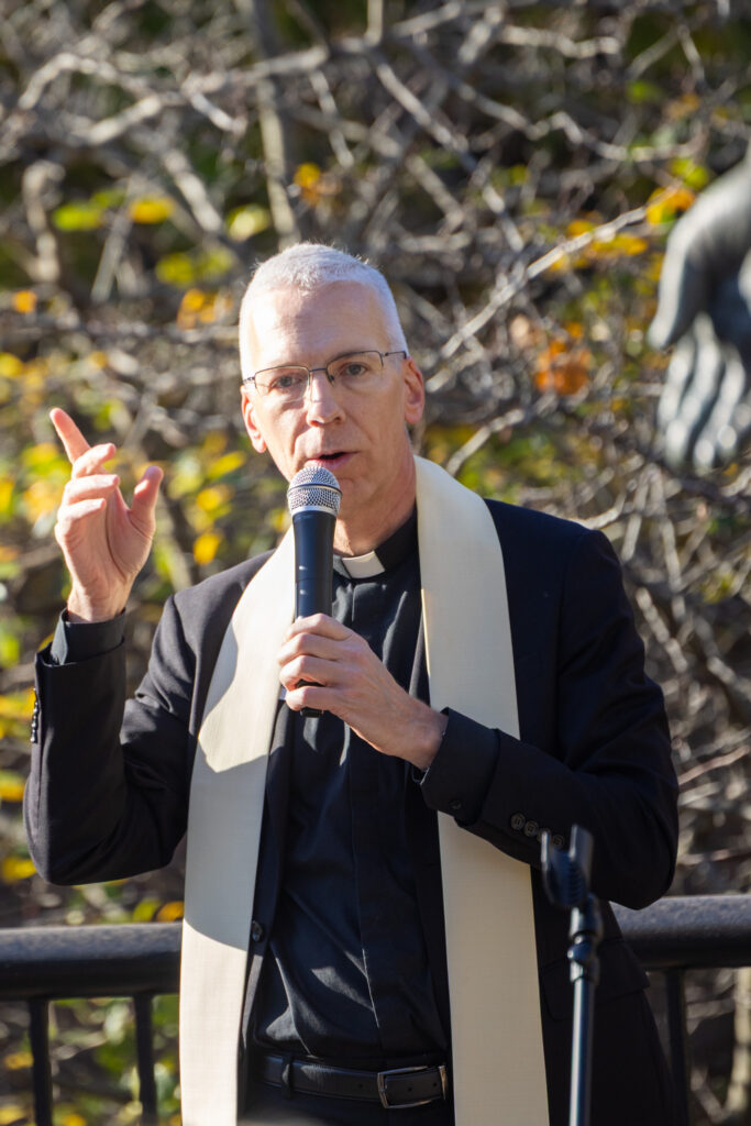 Father Joseph Taphorn speaking at the Grotto ceremony.