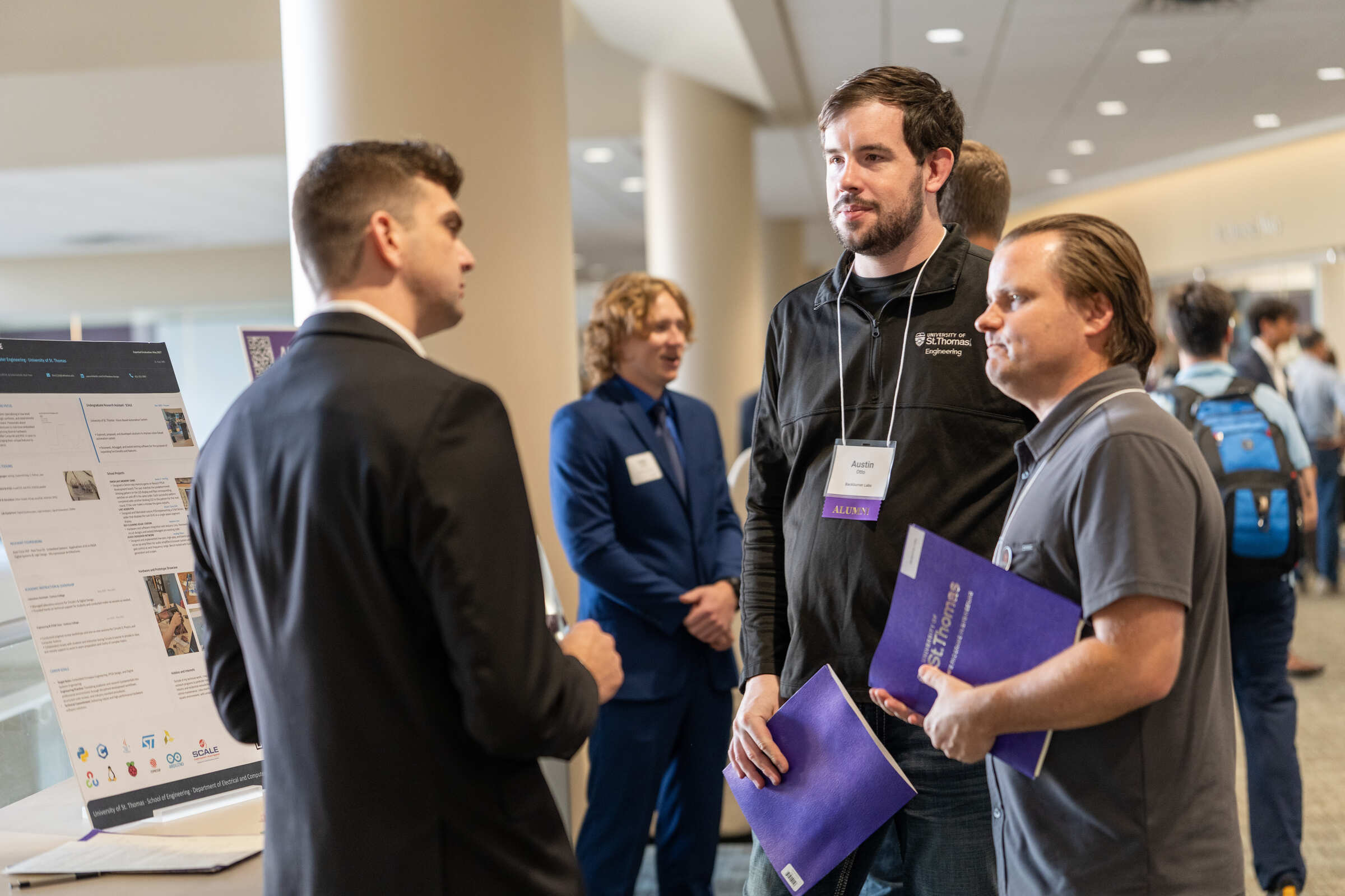 Recruiters meeting a student.