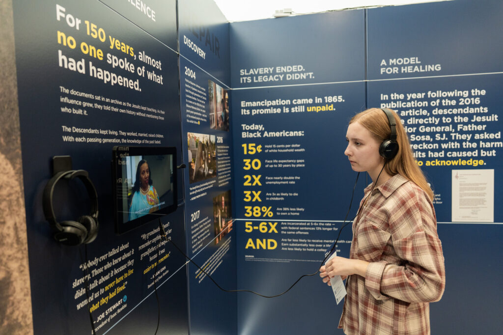 What We Inherit exhibit with student